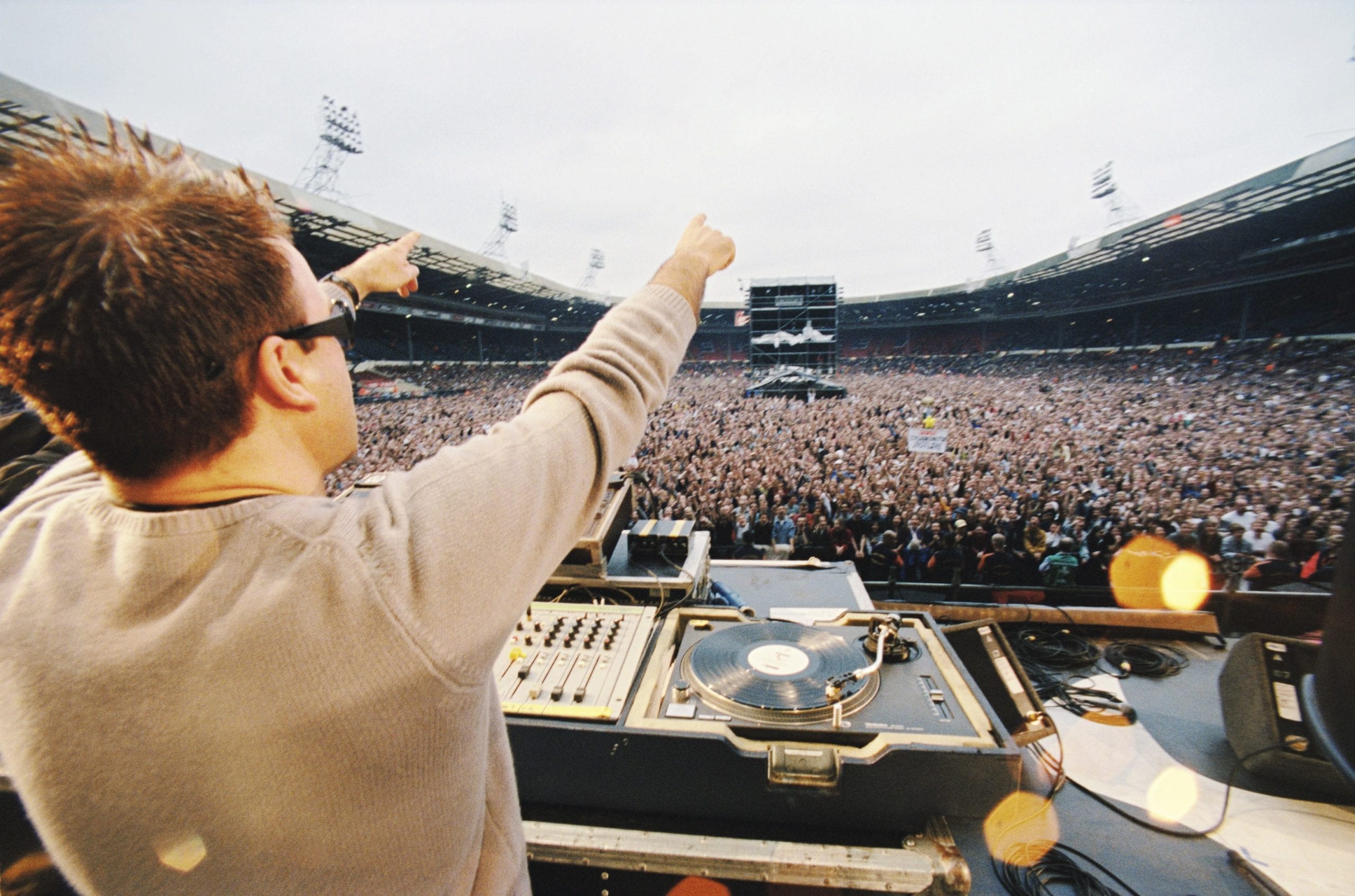 Paul Oakenfold plays to a huge crowd. NetAid - The Old Wembley Stadium, London, 1999 © Grant Fleming