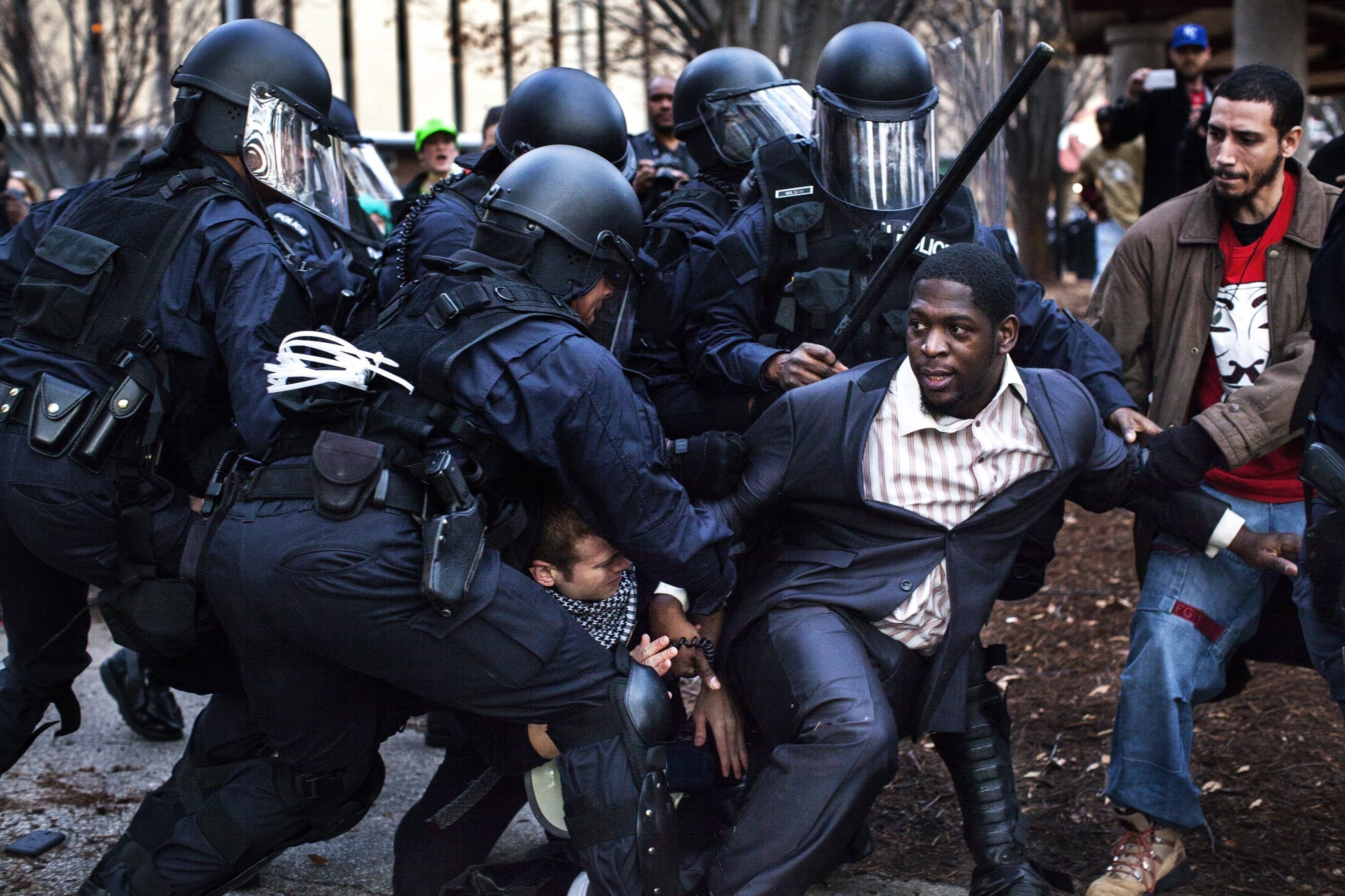 30th November, 2014. Ferguson, MO. Bishop Derrick Robinson, who has become a notable leader among the Ferguson, MO, protesters, was arrested by riot police while protesting in a public park after a non-violent march.