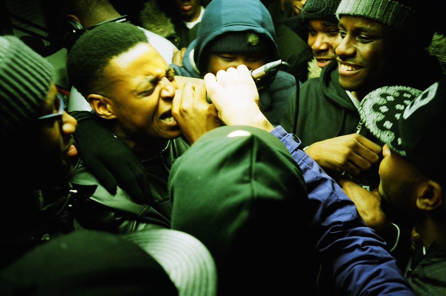 Multiple MC’s trying to seize the microphone from MC Tempo at Once Upon a Grime’s 5th Birthday set. Deja Vu, 2015 © Wot Do You Call It