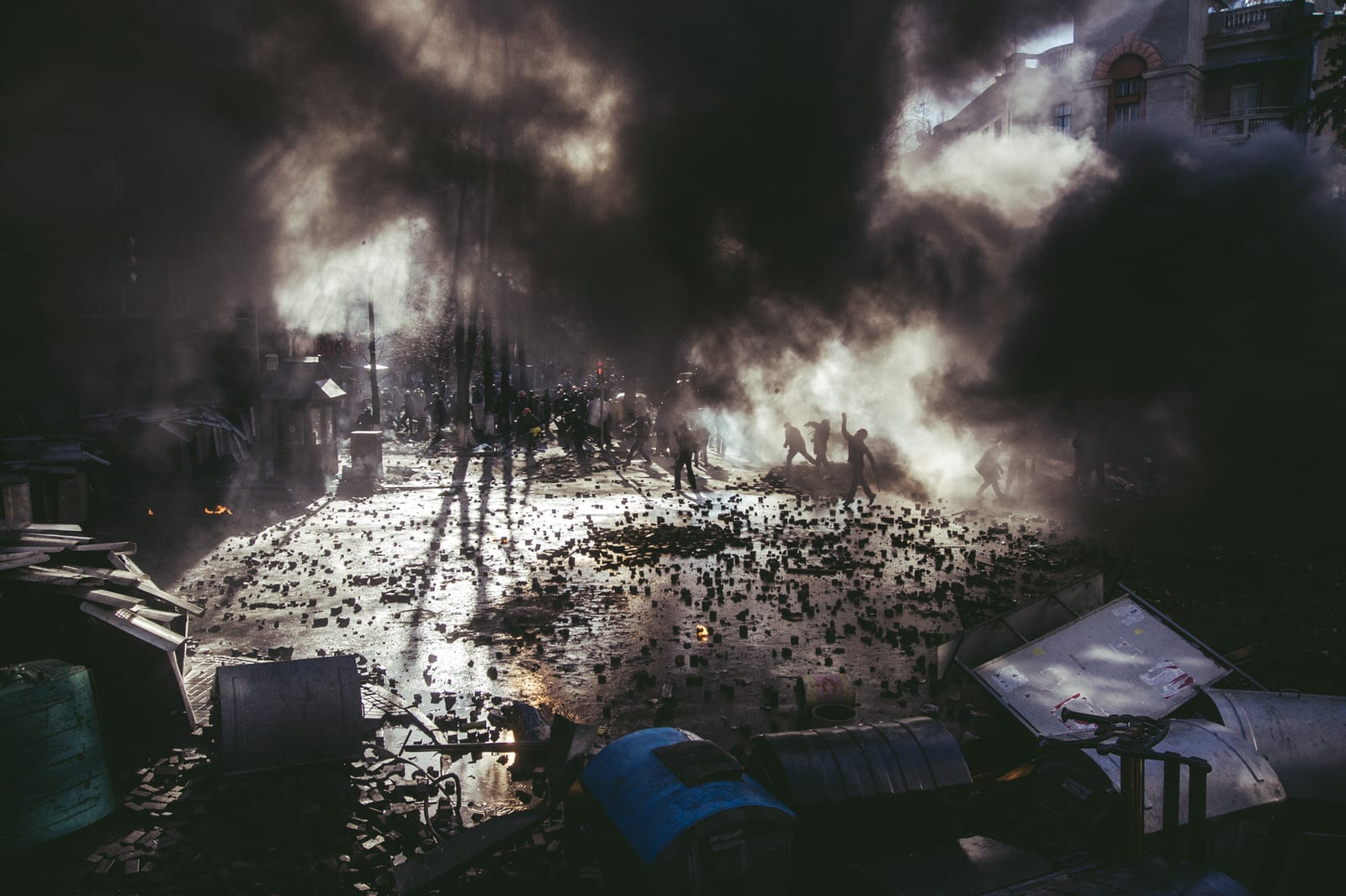 Confrontation between riot police and protesters on Shelkovichna street during the storming of the Ukrainian Parliament). 18th February 2014