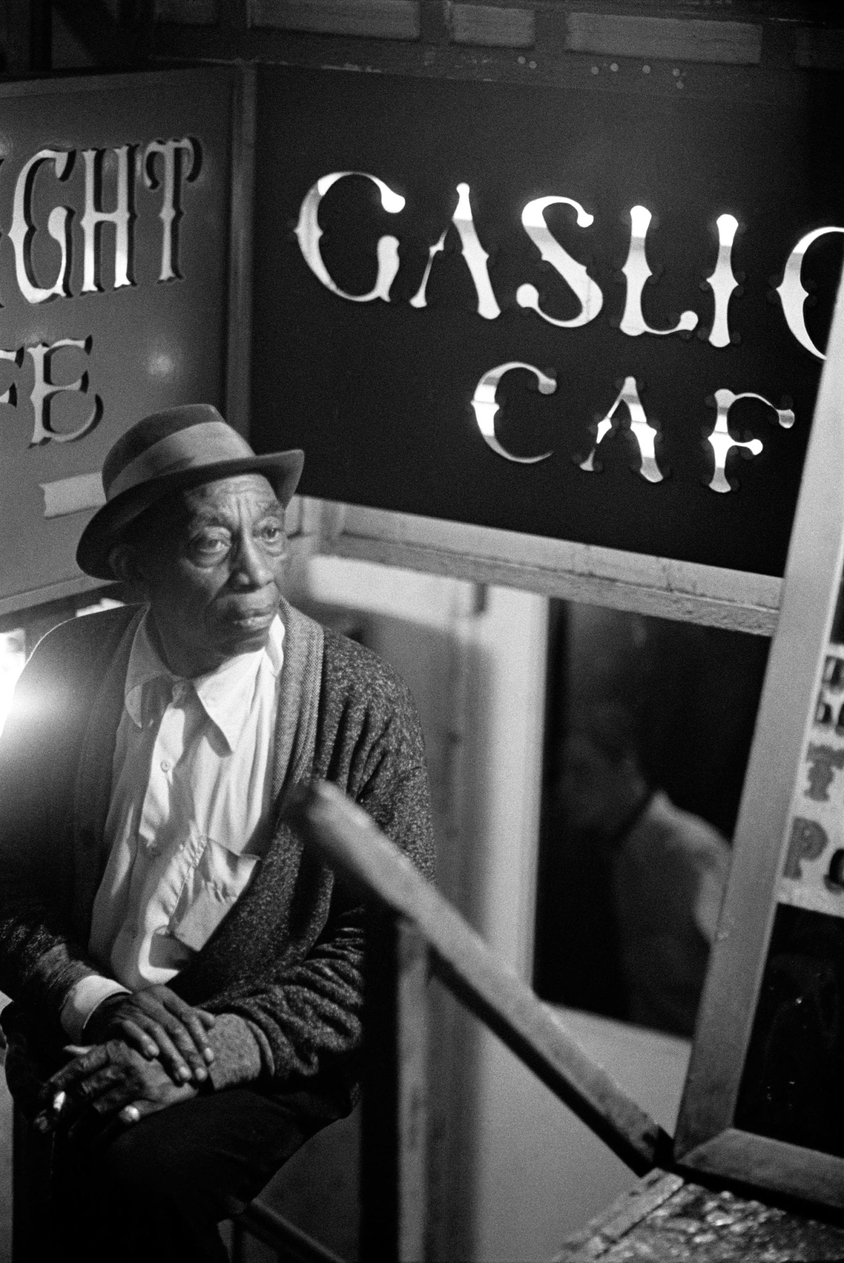 Mississippi John Hurt, outside The Gaslight Cafe, New York City, c. 1963