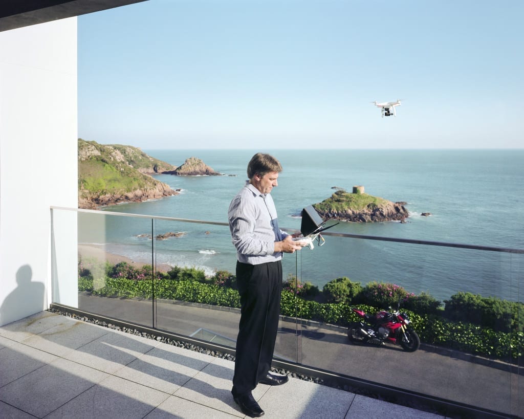 Mark Loane flies one of his drones at his home in Jersey. 