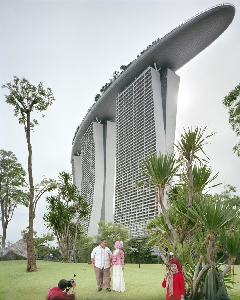 Naval El Farveisa, 29, and his bride-to-be pose for their pre-wedding photos in front of the Marina Bay Sands Hotel.
