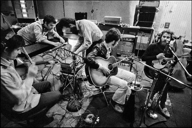 Getting ready for a take while recording The Band album, the pool-house studio. West Hollywood, CA, ’69