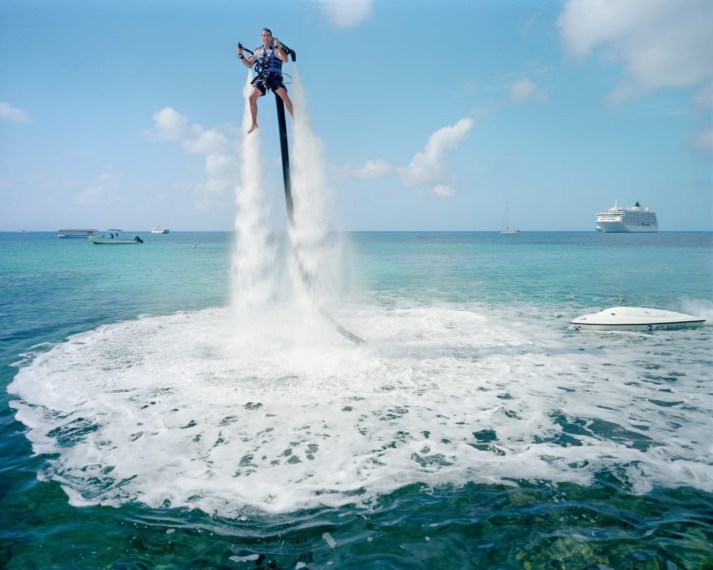 An employee of Jetpack Cayman demonstrates this new watersport, now available on the island, Grand Cayman.