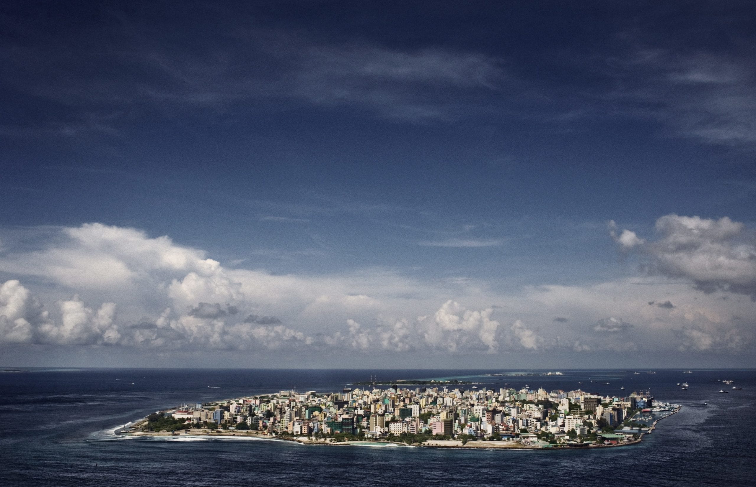 Malé, Maldives. October 2009 Malé, one of the most densely populated cities in the world, as seem from a plane. Nearly 104,000 people cram on 5,798 square meters.