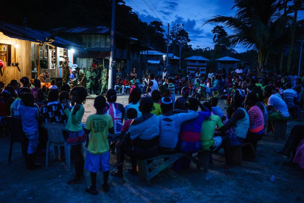 Residents of a small village gather to hear the FARC talk. They are welcomed to share their views on the on-going peace process in Havana. 2 May 2016. Photo © Federico Rios