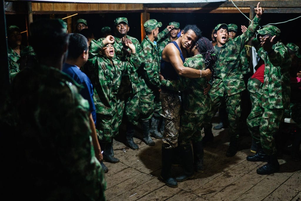 A group of FARC rebels dance and celebrate the front leader’s birthday. 3 May 2016. Photo © Federico Rios