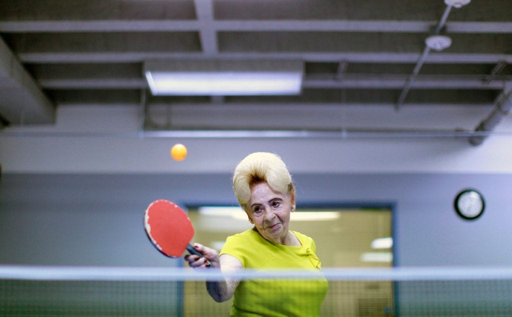 Lucy Nicholson (American/British, born England). Alzheimers Ping Pong Therapy, Los Angeles, CA, 2011, printed 2016. Inkjet print, 10 5/8 x 16 3/8 in. (26.9 x 41.5 cm). Courtesy of Lucy Nicholson/Reuters