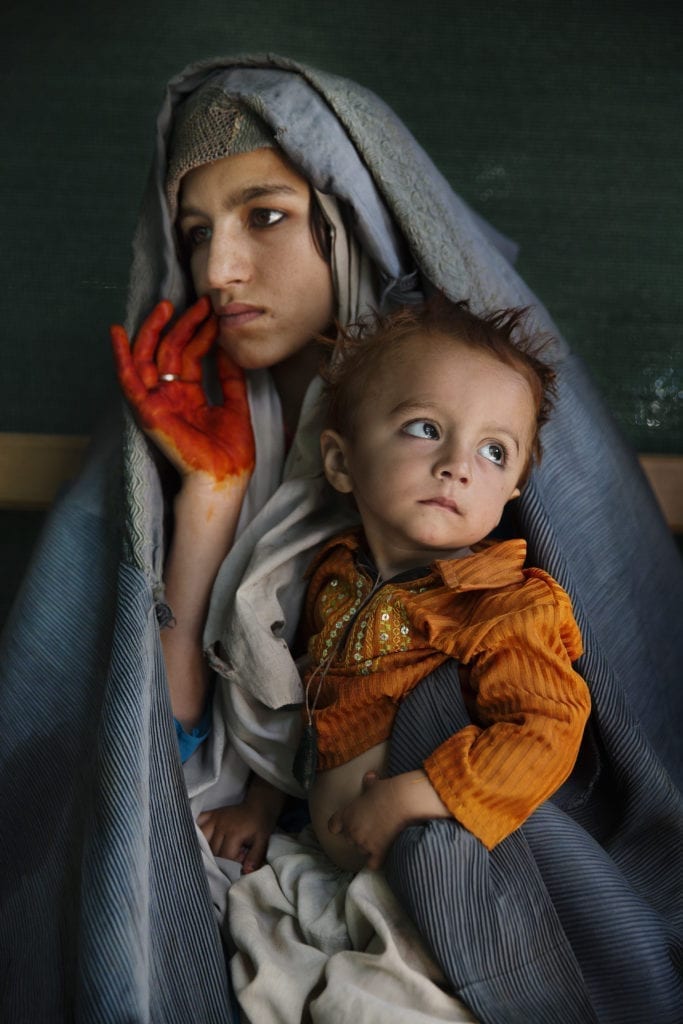 Razima holds her two year old son Malik