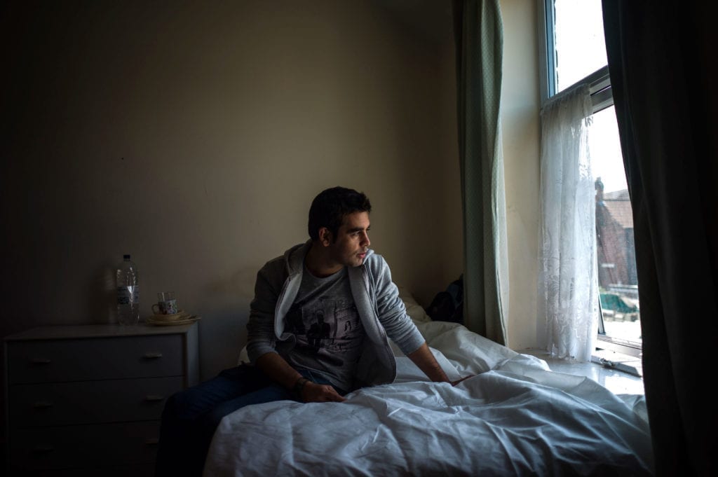 Programme Name: Exodus: Our Journey to Europe - TX: n/a - Episode: n/a (No. 3) - Picture Shows: awaiting the outcome of his asylum application in Wakefield. Ahmad - (C) Gus Palmer / KEO Films - Photographer: Gus Palmer