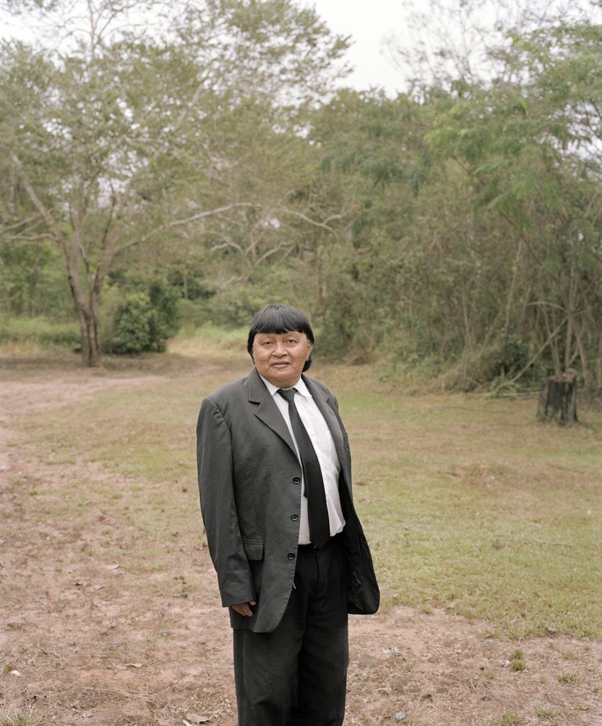 "Porteiro", the church doorkeeper. The Surui all speak the indigenous language and are proud to defend their identity.However, since the firts contact with the outside, various influences changed the daily routine of the Surui lifestyle : an evangelic church is the weekly meeting place for the community and the mass is spoken in the Surui language.