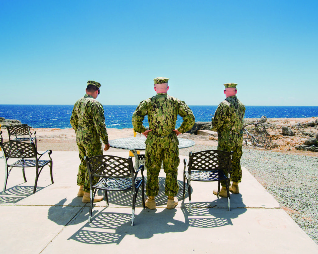 Smoke Break, from the series Welcome to Camp America © Debi Cornwall, given a solo show at the Lianzhou Foto Festival.