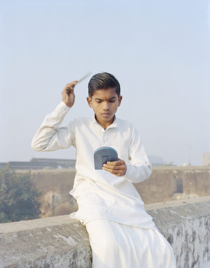 Rama combing his hair, Ayodhya, Uttar Pradesh, 2015. From A Myth of Two Souls © Vasantha Yogananthan