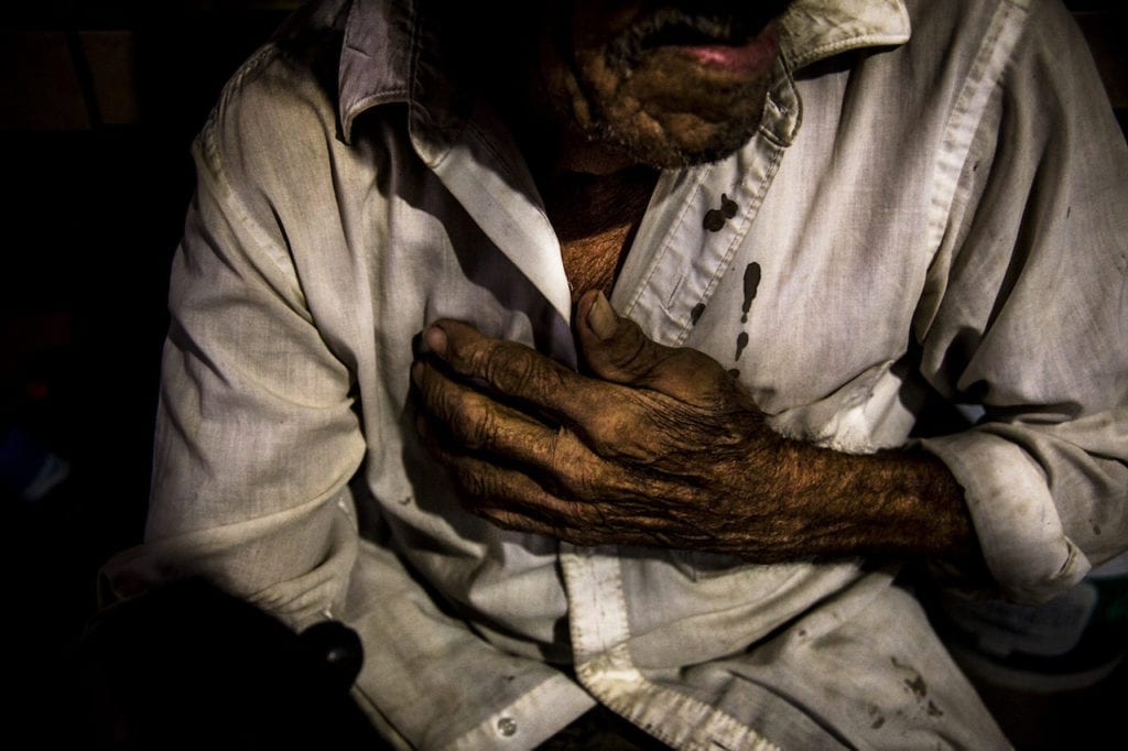 Digno Cruz (the photographer's father-in-law) crying at home in Guerrero, Mexico, while he talking about his missing grandsons. The discovery of several mass graves during the search of the 43 normalistas Ayotzinapa, Guerrero, shows the magnitude of the crisis of enforced disappearances in the country. The government has found 60 clandestine graves in the cities of Iguala-Taxco with at least 129 bodies (20 women and 109 men). None of them belonged to the 43 normalistas who went missing in Iguala during the month of September 2014. Official figures show that in recent years there have been 25 000 700 disappearances and Guerrero is one of the Mexican States worst affected. This image is from the series La casa que sangra , or Broken Roots, by Yael Martinez, which won the photographer second prize in the PHmuseum grant last year. Image © Yael Martinez