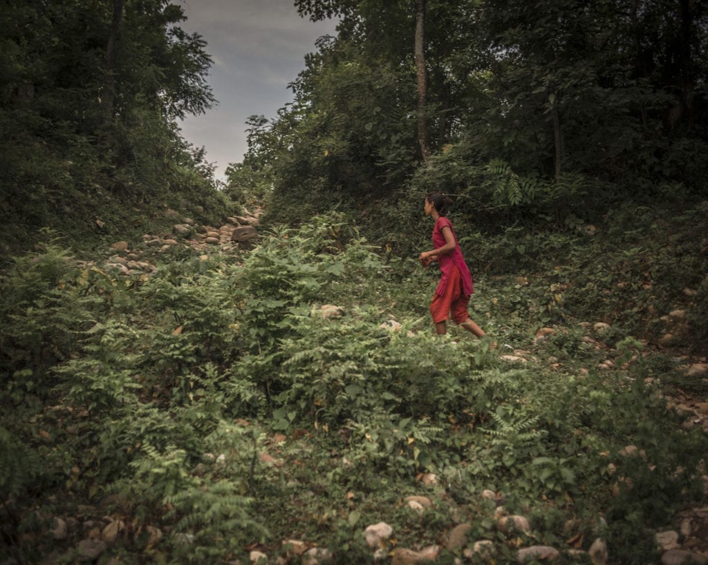 Radha Bishwa Karma, 16 years old. "My parents don’t work in India. My grandmother doesn’t let me stay at home. She gets cross if I come home and I often don’t get my meals. I wish sometimes my mother was here to take me home or give me medicine, especially when I am in pain. It’s dark, and there is no light. I feel so scared someone might come." Surkhet district, Nepal