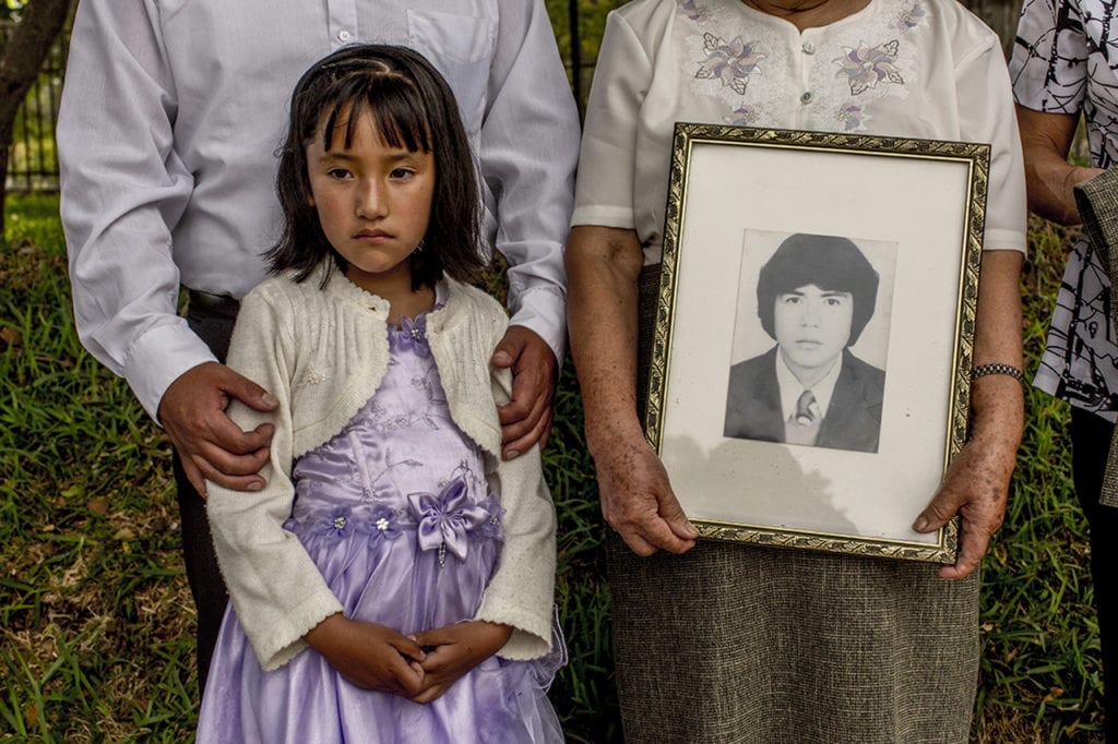 Nephew of the missing Walter Camino Lopez (in the picture); during the placement of commemorative stones in honor of terrorism victims in "El ojo que llora"; a memorial sculpture in Lima. ©Musuk Nolte / Native Agency