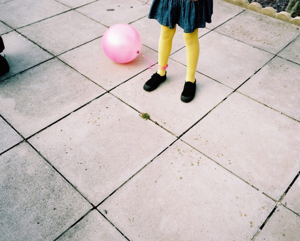 Ball and yellow legs. From the series My Favourite Colour Was Yellow © Kirsty MacKay