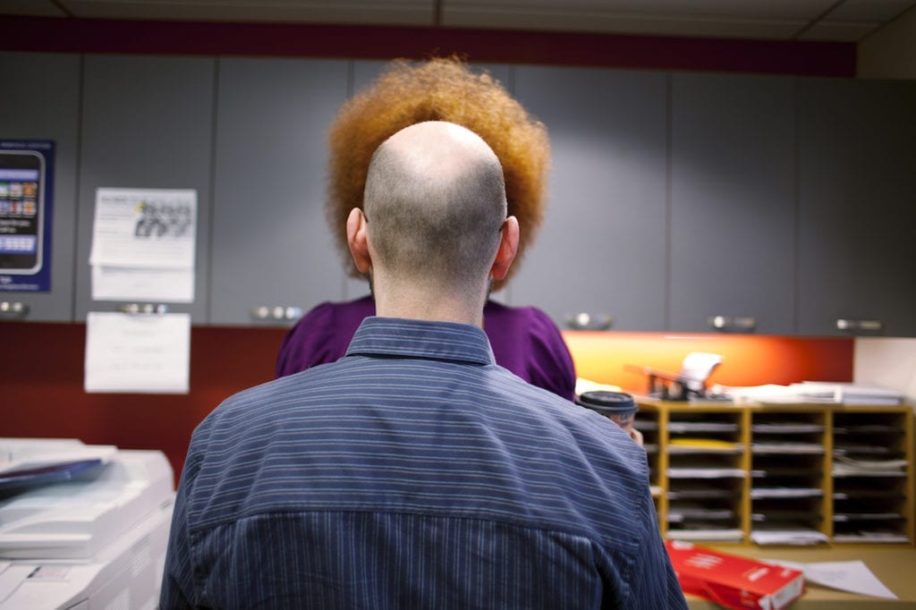 Co-Worker, from the series Can I Touch It? © Endia Beal, which looks at the kinds of hairstyles typically worn by black women in the corporate world of work