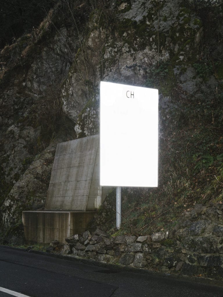 Sign at the entrance of the Swiss territory from a peripheral custom, from the series 'How to secure a country' © Salvatore Vitale, courtesy of the artist