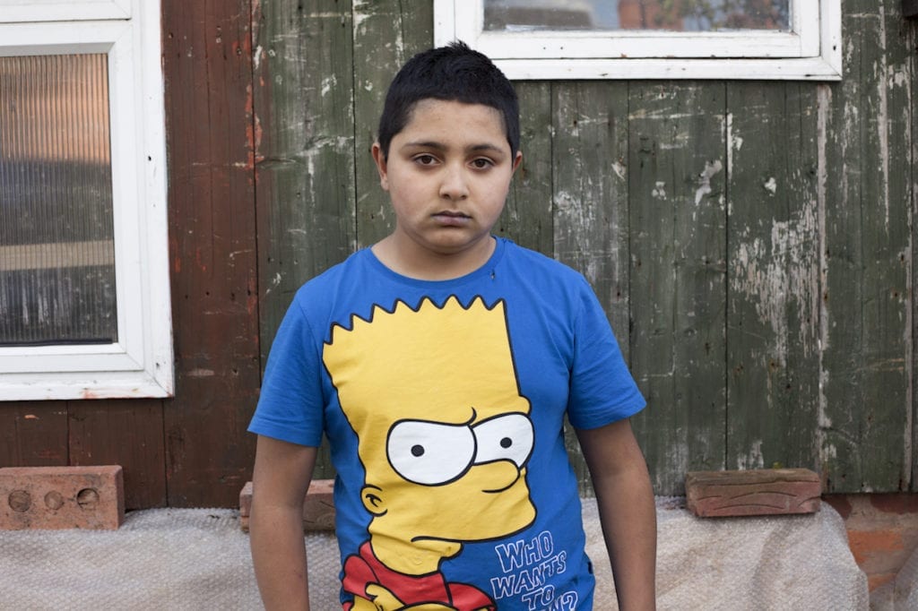 Young boy with Bart Simpson, from the series You Get Me?, 2009 © Mahtab Hussain, courtesy the artist