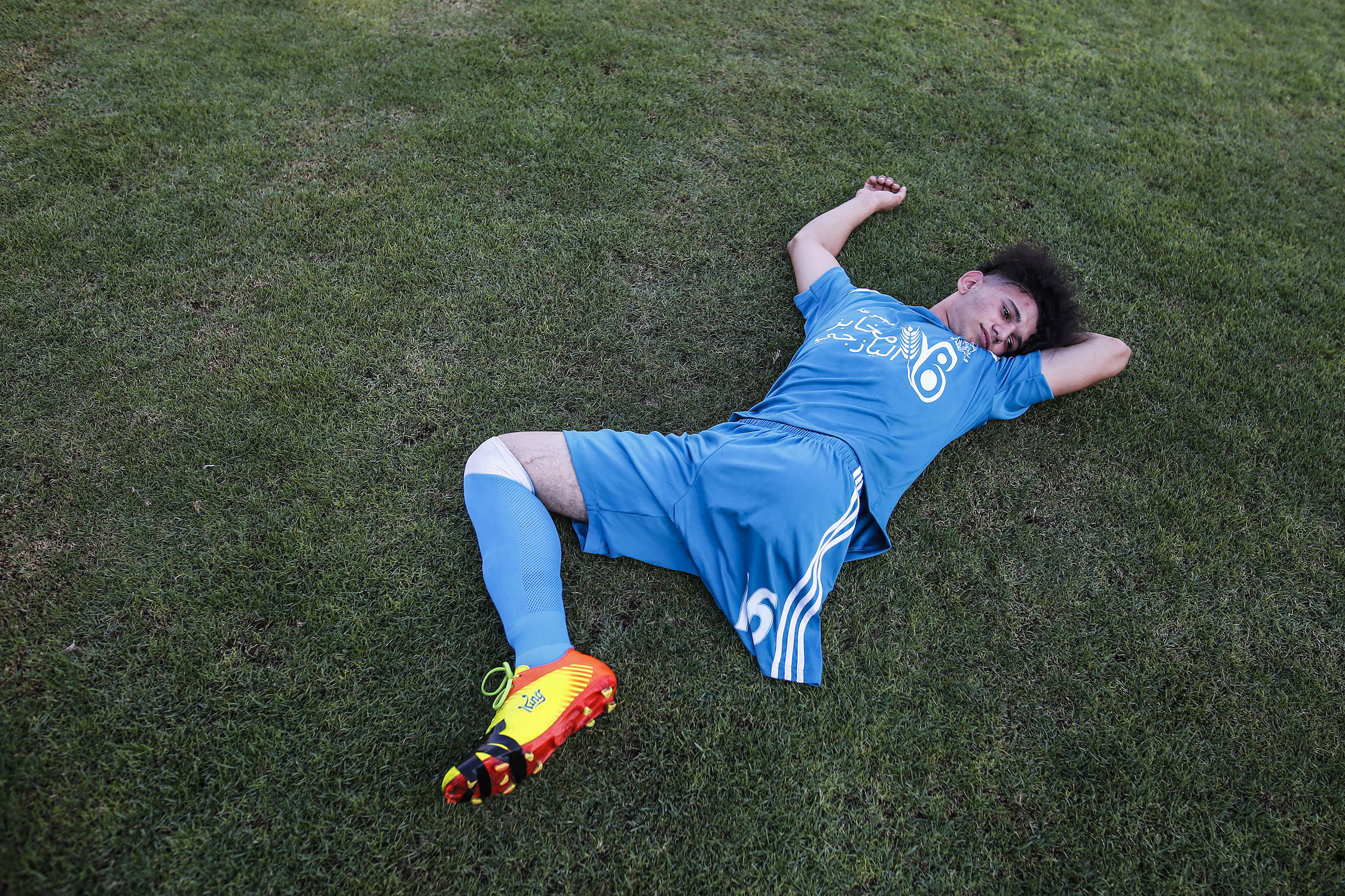 Palestinian amputee soccer player take a rest after a league match for amputees in Gaza Strip, on 10 August, 2021.