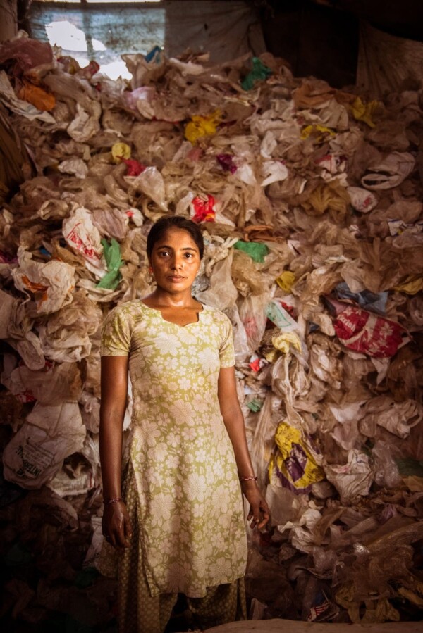 Lady sorting plastic bags