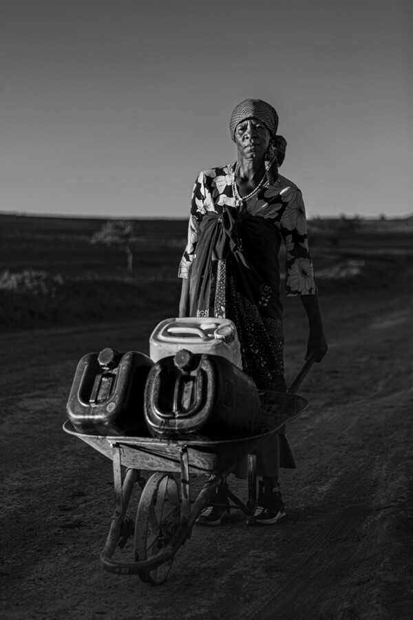 Water Carrier - Malealea, Lesotho