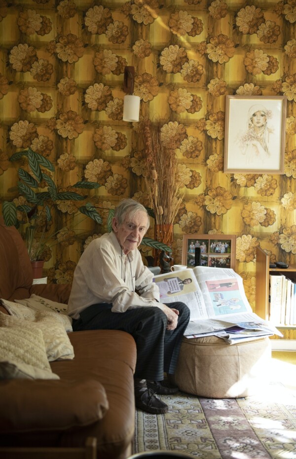 John in his living room