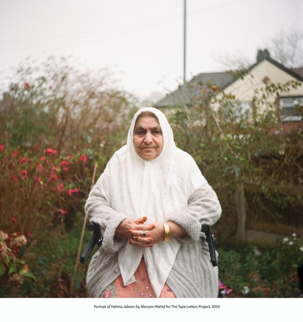 Portrait of Halima Jabeen in her front garden