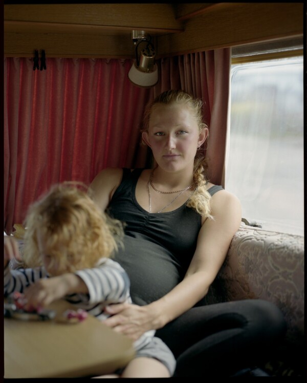 Amber, Gunner and bump at home in their caravan