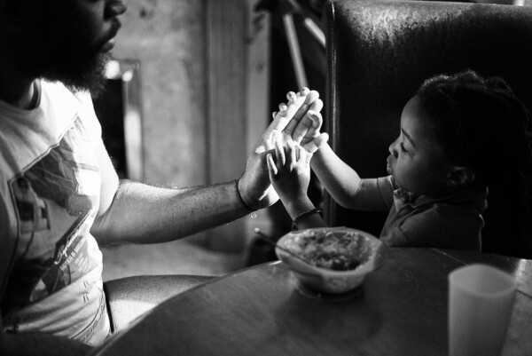 A playful interlude between spoonsof rice and stew