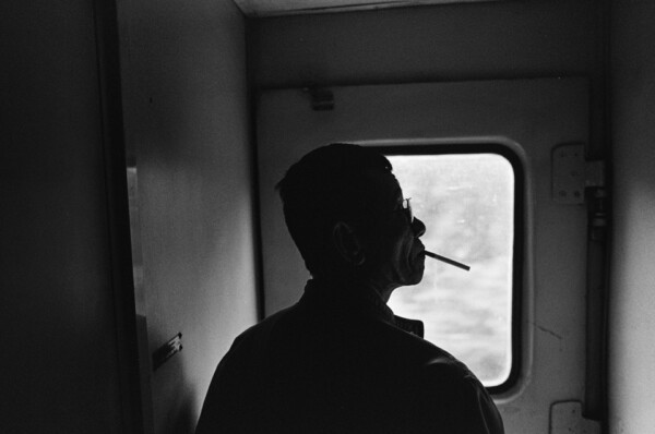 Smoke Break in the Train Carriage